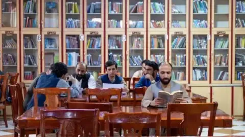 Afghanistan's rulers outlaw books authored by women from the nation's colleges